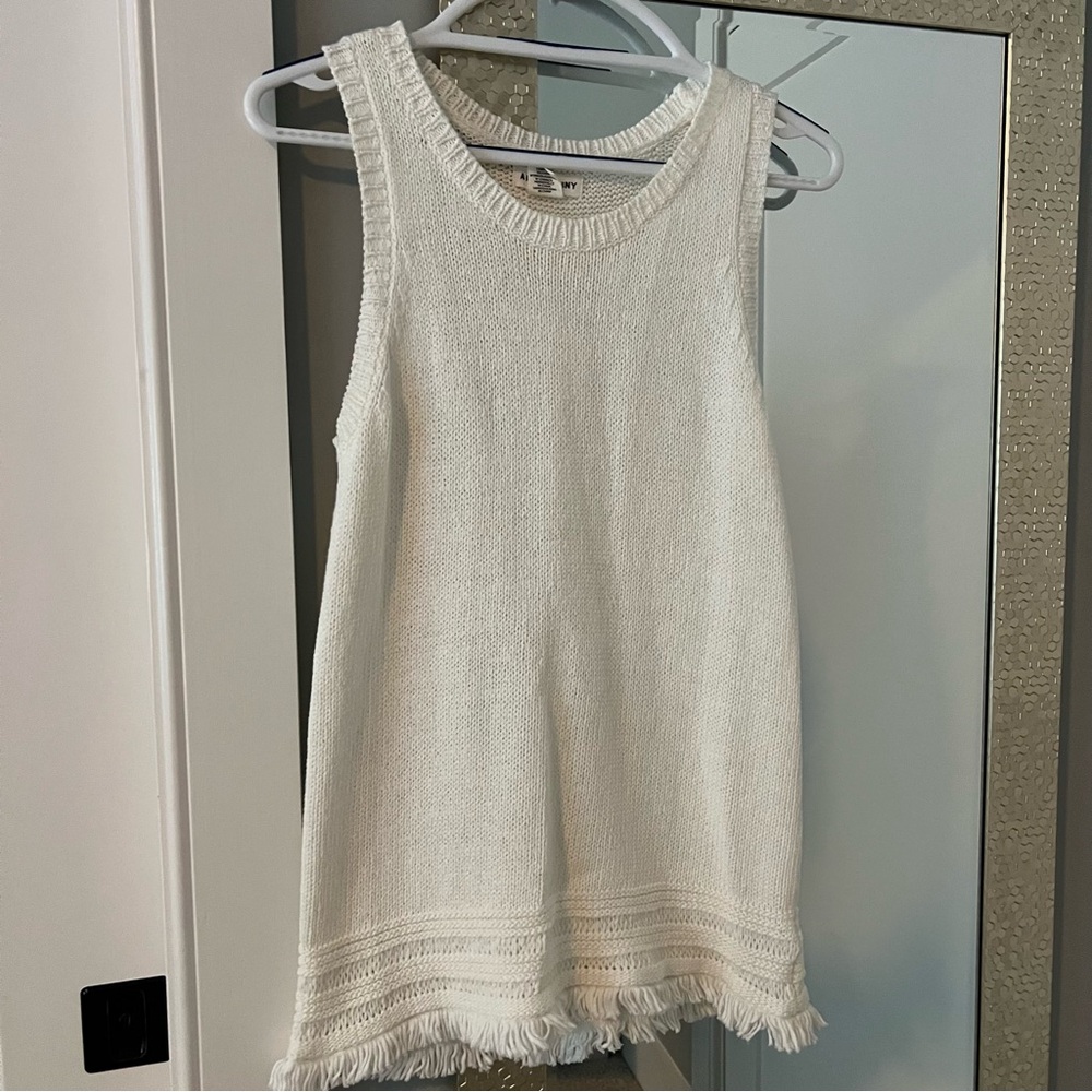 White Sleeveless Knit Top with Fringe Hem